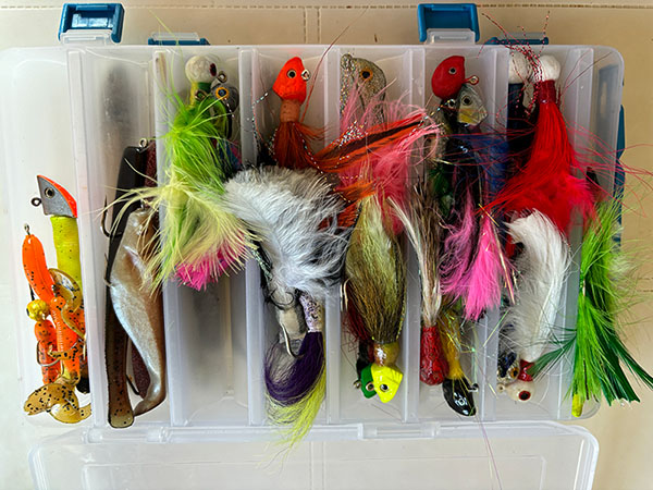 Señuelos de plumas con cabeza plomada