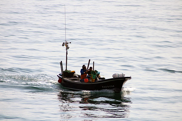Volviendo de faenar en Lastres en Asturias